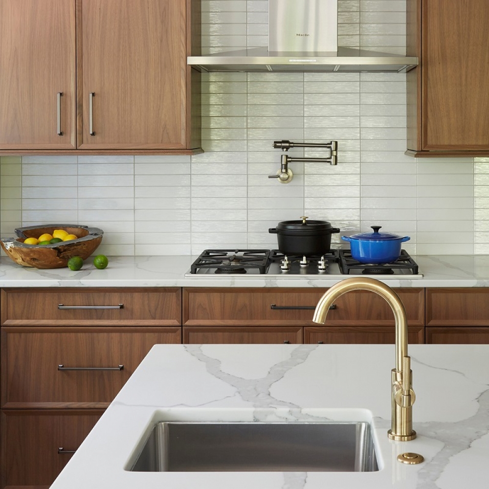 Walnut kitchen cabinets with traditional blue base cabinet